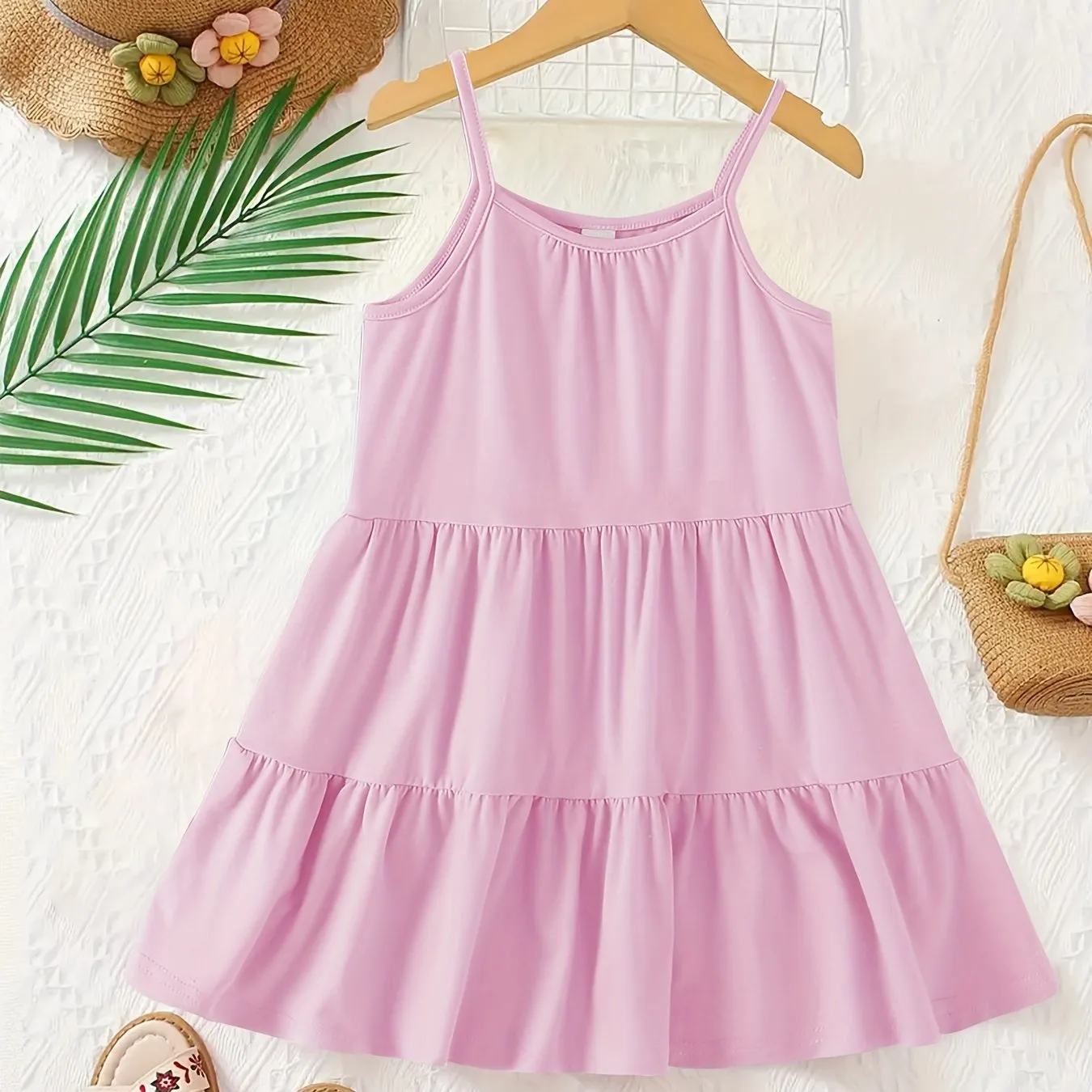 Chic & Playful Summer Essential: Girls' Solid Color Sleeveless Dress - Comfortable, Stretchable Fabric with Flared Hem for Daily Fun