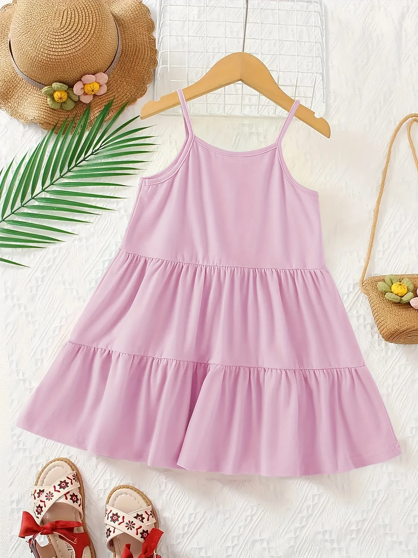 Chic & Playful Summer Essential: Girls' Solid Color Sleeveless Dress - Comfortable, Stretchable Fabric with Flared Hem for Daily Fun